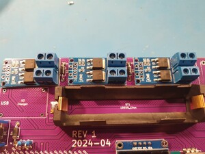 MOSFETs in place, top